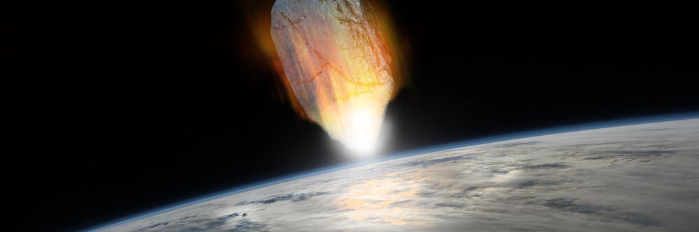 asteroid burning through the Earth's atmosphere and about to hit the surface